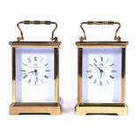 A pair of late 20th century gilt brass carriage clocks  by Matthew Norman, the enamel dials