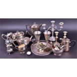 A three-piece silver plated tea set together with a collection of further silver plated items,