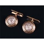A pair of 18ct yellow gold cufflinks in the style of Bulgari, each with a circular embossed white