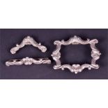 An early Victorian silver buckle of shaped rectangular form in the rococo style, London hallmarks,