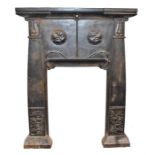 A good quality Art Nouveau period cast iron fire surround the tapering squared pilaster sides