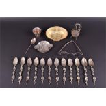 A small group of silver and white metal items to include a gilt metal dish, a miniature three-