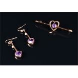 A gold bar brooch set with an amethyst together with a pair of drop earrings with amethyst