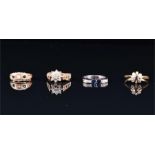 A 9ct white gold, diamond, and sapphire ring the angular mount set with two square-cut sapphire,