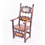 A German mahogany throne chair 17th century or later, with carved scrollwork bars to the back, set