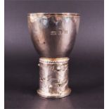 A silver Arts & Crafts style goblet by Michael Allen Bolton London 1988, the ovoid hammered bowl