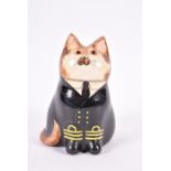 A Joan and David de Bethel Rye pottery cat with hand painted naval uniform and glass eyes, painted