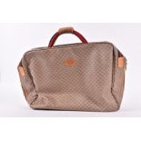 A vintage Gucci monogrammed Carry on travel bag  with striped handle and zipped interior pocket,