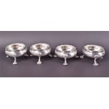 A set of four George II silver cauldron salts London 1753 by Peter Taylor, with gadroon rims, on