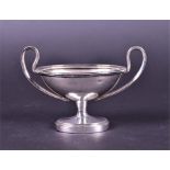 A Russian silver twin-handled salt on an oval pedestal base, 11 cm wide, 3.2 ozt.