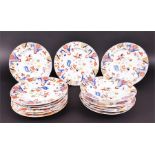 A collection of late 19th century patterned porcelain bowls and plates in the Aesthetic Manner