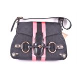 A Gucci Tom Ford Horsebit black clutch bag with pink vertical stripes and rose gold coloured mounts,