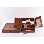 A Victorian mahogany and brass inlaid writing box of rectangular form, the interior fitted with