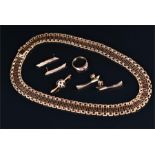 An 18ct yellow gold segmented collar necklace the articulated openwork segments in the Greek key