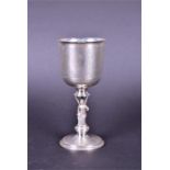 A George V silver goblet by Edward Barnard & Sons Ltd, London 1927, the stem formed as a medieval