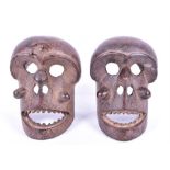 A pair of monkey Mbuli masks from South Cameroon circa.1960, each 23 cm high. (2)