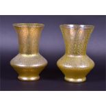 A pair of  Loetz Candia Mimosa vases each of bladed bulbous form with drawn tapering necks, 19 cm