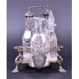 A George II Silver five bottle cruet stand with four bottles  by Jabez Daniell, London 1752, of