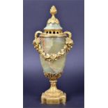 A good quality 19th century ormolu mounted lidded onyx vase of baluster form, the finely detailed