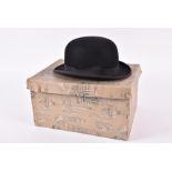 A mid-20th century Harrods bowler hat  in original Harrods box, 30 cm in length, inside