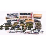 A collection of boxed and loose military diecast vehicles to include examples by Dinky and Corgi,