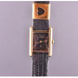 Cartier, Tank, a ladies vermeil manual wind wristwatch no. 03 00393, the black dial with black sword