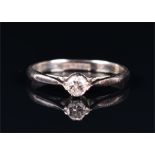 An 18ct white gold solitaire ring the round brilliant-cut diamond of approximately 0.15 carats, size