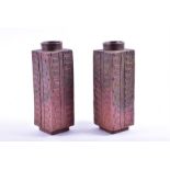 A pair of Chinese rust-coloured stone ware Cong vases 19th or 20th century, of square form with