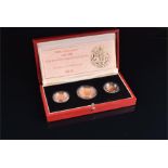 A gold proof sovereign three-coin set comprising of a half sovereign, full sovereign, and double
