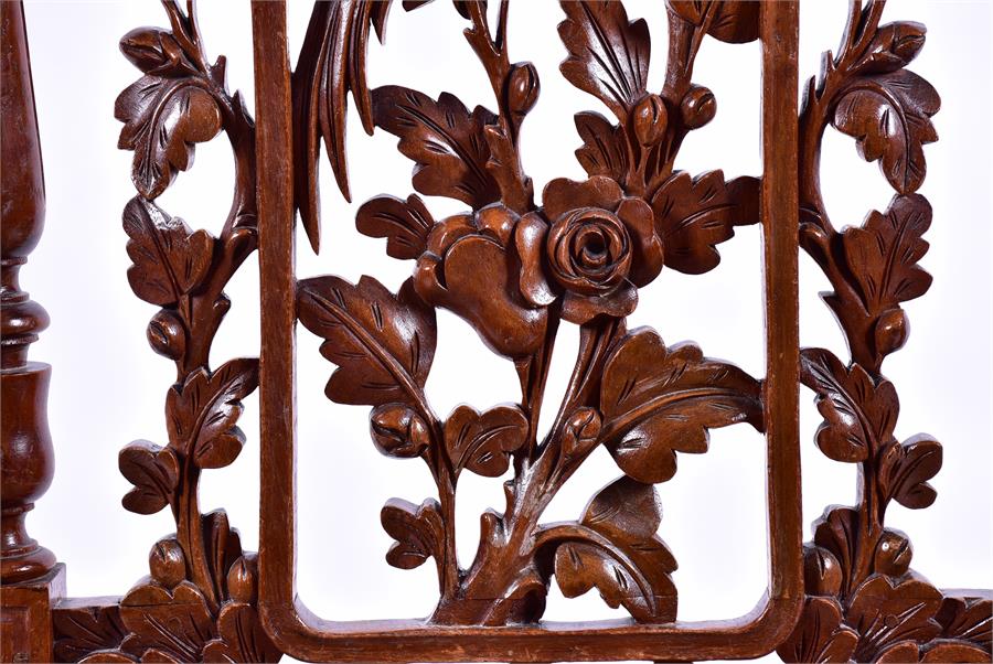 An early 20th century oak side chair with detailed armorial carving over pierced acorn, leaf and - Image 5 of 6