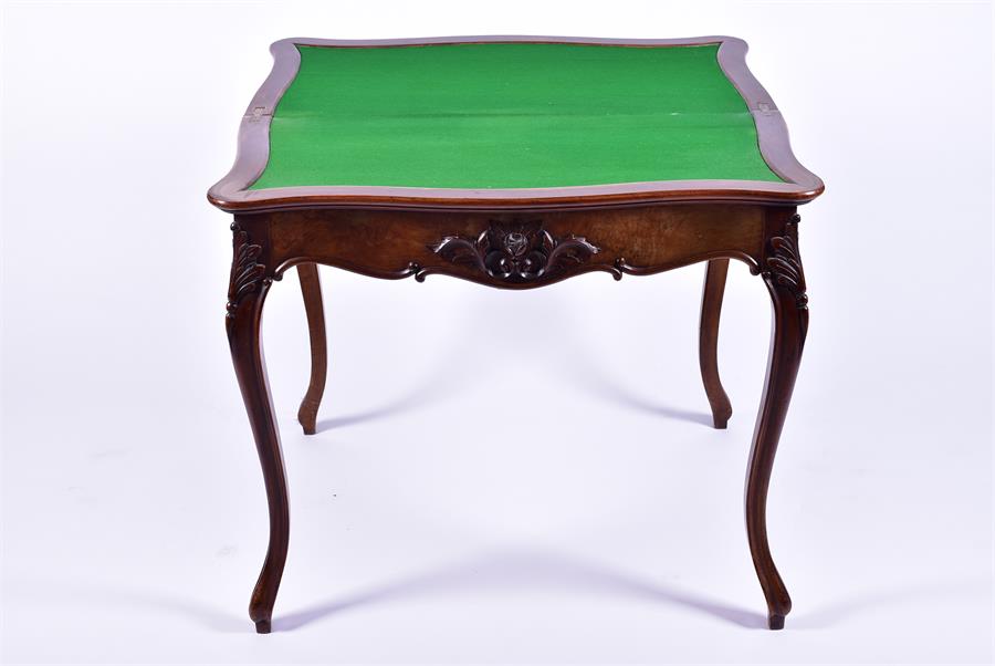 A late 19th century French walnut folding card table the serpentine top opening to reveal a baize - Image 7 of 7