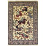 A 20th century Persian part silk carpet the central mushroom field depicting huntsmen pursing prey