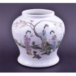 An early 20th century Chinese polychrome enamelled jar the exterior painted with three ladies