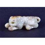 A Chinese carved jade figure of a recumbent auspicious beast late Ming/early Qing period, 5.3 cm