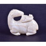 A Chinese jade carved figure of a recumbent deer late Ming/ early Qing period, 4.5 cm wide.