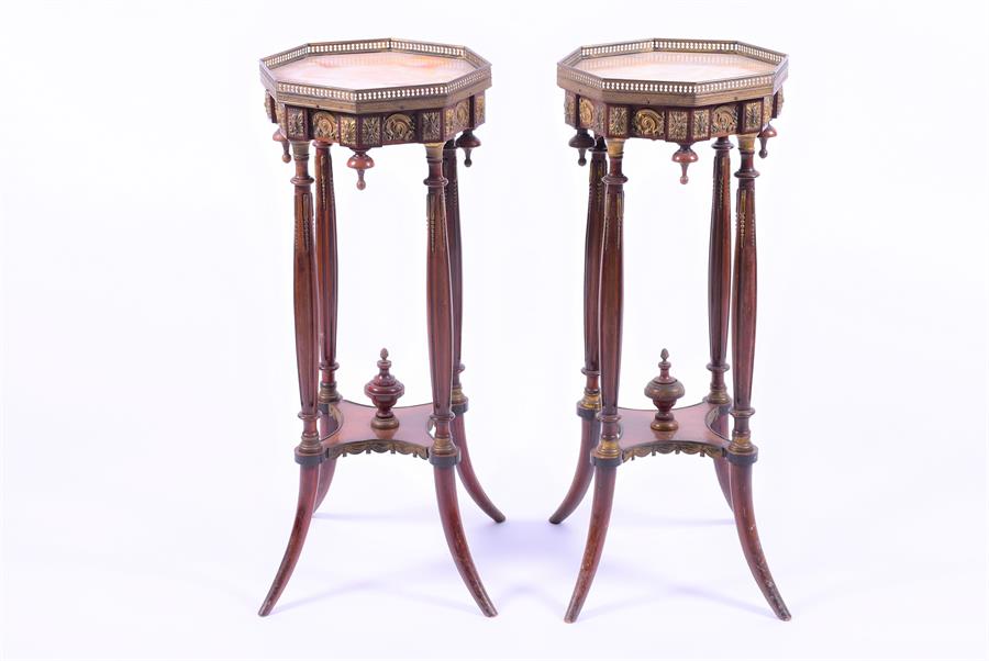 A pair of 19th century French Empire style jardinière stands the octagonal marble tops with brass