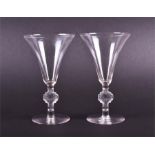 A 1920s pair of R Lalique 'Barr' table glasses of inverted bell form on a frosted stem with mask