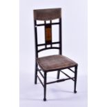 An Arts & Crafts side chair with upholstered top and seat, the back splat inlaid with a Mackintosh