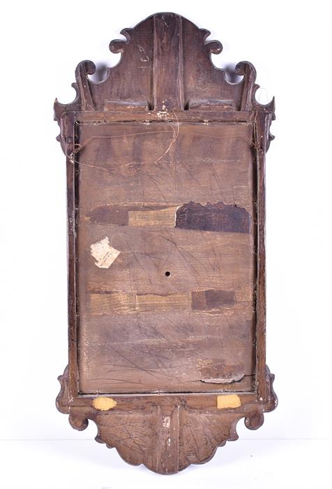 An early 19th century mahogany wall mirror with fret carved decoration, the glass 49 cm x 31 cm. - Image 2 of 5