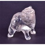 A Chinese rock crystal carving of a standing auspicious beast 19th century Qing period, 4 cm high.