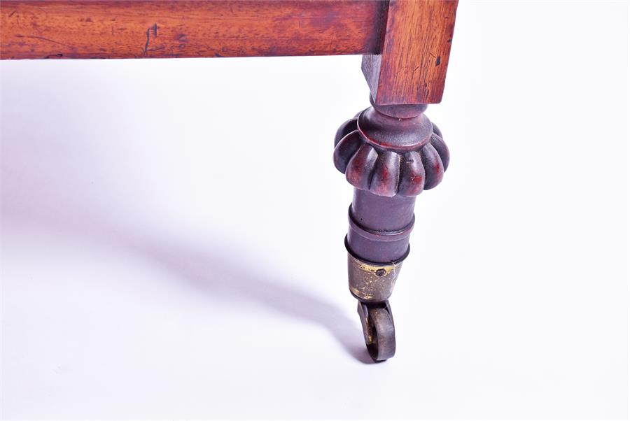 A Victorian mahogany three tier whatnot with carved frieze and turned supports to brass castors. - Image 3 of 4