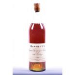 A bottle of Barnett 1860 Vintage Liqueur Champagne Cognac.