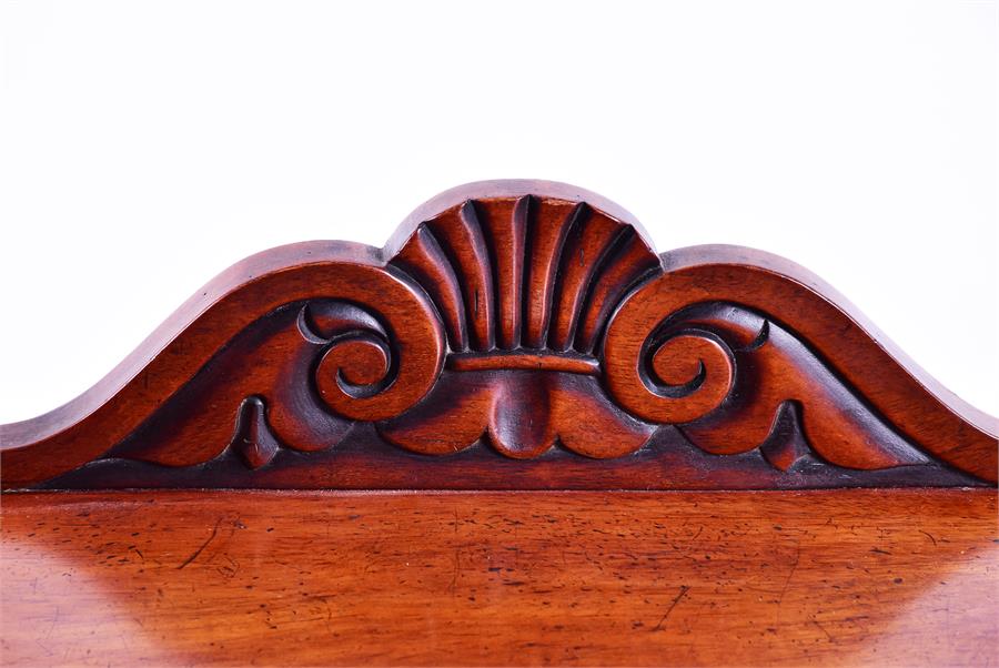 A Victorian mahogany three tier whatnot with carved frieze and turned supports to brass castors. - Image 2 of 4