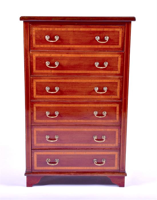 An Edwardian mahogany sheet music / document chest of six drawers each with looping brass handle and