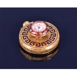 A rare Le Coultre gold and enamel miniature stud / lapel watch or clock the white enamel dial with
