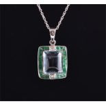 An 18ct white gold, diamond, aquamarine, and emerald pendant set with a sugarloaf cabochon