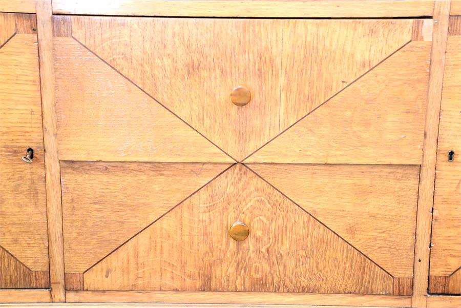 A large early 20th century pale oak triple bookcase with three glazed doors enclosing shelves, - Image 2 of 3