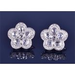 A pair of 18ct white gold and diamond floral cluster earrings each set with six open-backed rose-cut