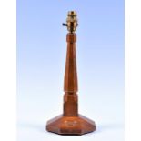 An Alan Grainger 'Acornman' carved oak desk lamp in the style of Mouseman, with gently tapering