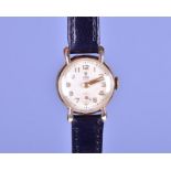 A Tudor Royal 9ct gold ladies wristwatch the silvered dial with gilt numerals, with hand wound